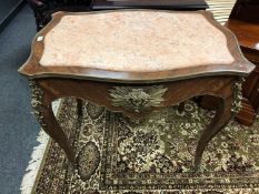 An inlaid walnut marble topped and ormolu mounted centre table,