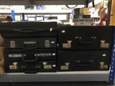 A collection of suitcases and briefcases