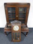 A pine double door glazed cabinet,