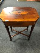 A 19th century continental inlaid mahogany work table