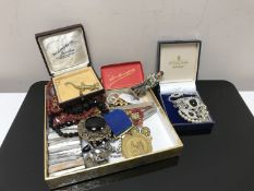 Two yellow metal rings and a quantity of costume jewellery, lizard brooch,