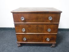 A Victorian mahogany commode chest with glass handles