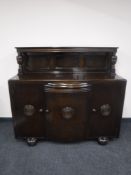 An oak buffet back sideboard