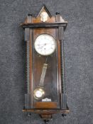 An early 20th century mahogany cased eight day wall clock