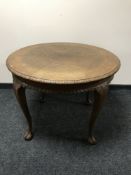 An early 20th century oak occasional table