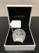 A silver equestrian brooch