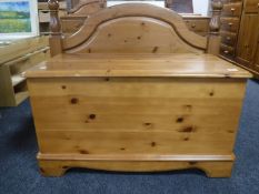 A contemporary pine blanket box