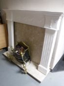 A painted plaster fire surround with marble back and hearth plus electric fire with coals