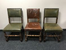 Three oak dining chairs