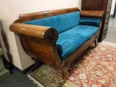 A nineteenth century continental scroll end settee,