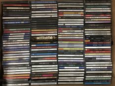 Two boxes and a crate of various CDs