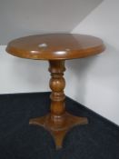 A circular pine poser bar table