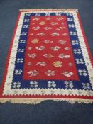 A Moroccan kilim rug 244 cm x 166 cm