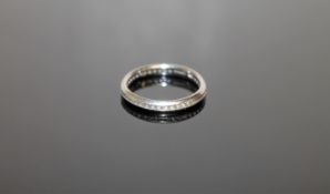 A platinum diamond eternity ring,