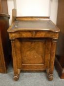 A Victorian walnut davenport,