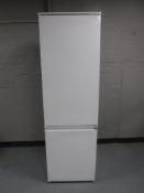 An integrated fridge freezer