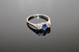 An 18ct gold sapphire and diamond ring