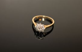 An 18ct gold diamond cluster ring,