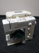 A boxed Bernina 1015 SE sewing machine
