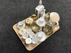 A tray of clock under shade, brass ornaments, decanter,