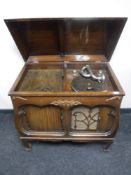 An early 20th century oak cased gramophone cabinet by Gilbert