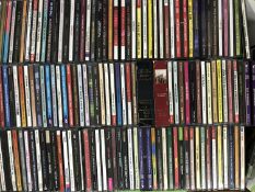 Three boxes of various CDs