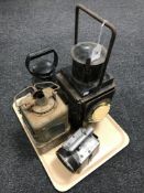 Four antique railway lamps