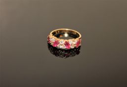An 18ct gold ruby and diamond ring,