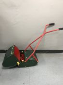 A vintage push garden mower