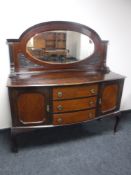 An early 20th century mahogany mirror back sideboard