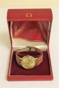 A Gents 18ct gold Omega Constellation automatic calendar centre seconds wristwatch, with Omega box.