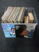A box of LP records and 45 singles - Rolling Stones etc