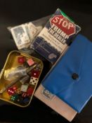 A silver thimble, a tin of dice, silver propelling pencil,