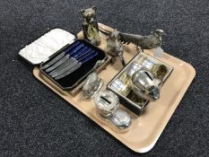 A tray containing a collection of novelty money boxes, napkin rings, silver plated pheasant,