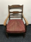 An antique mahogany armchair