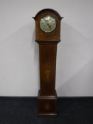 An inlaid mahogany Granddaughter clock