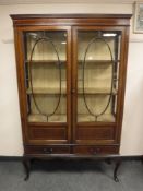 An Edwardian inlaid mahogany display cabinet,