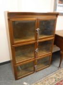 A mid twentieth century mahogany glazed stacking bookcase,