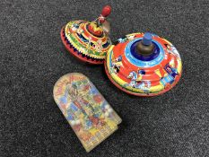 Two vintage Chad Valley spinning tops and a Robin Hood pin ball machine