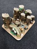 A tray of eleven Hornsea fauna vases