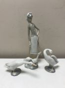 Three Lladro figures;