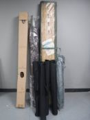 A boxed garden parasol,