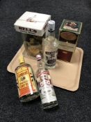 Five bottles of alcohol; Courvoisier Luxe Cognac 70cl, Bell's Scotch Whisky 75cl,