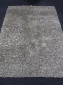 A contemporary shaggy pile rug