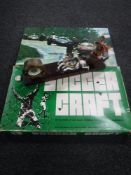 A contemporary chariot mantel clock,