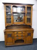 An Edwardian oak kitchen dresser