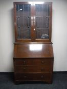 An Edwardian mahogany bureau bookcase