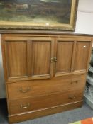 A late Victorian mahogany ecclesiastical cabinet fitted with drawers internally