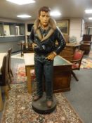 A life-sized figure of James Dean, height 186 cm.