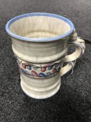 A Crown Ducal ribbed vase with handle, height 18cm,